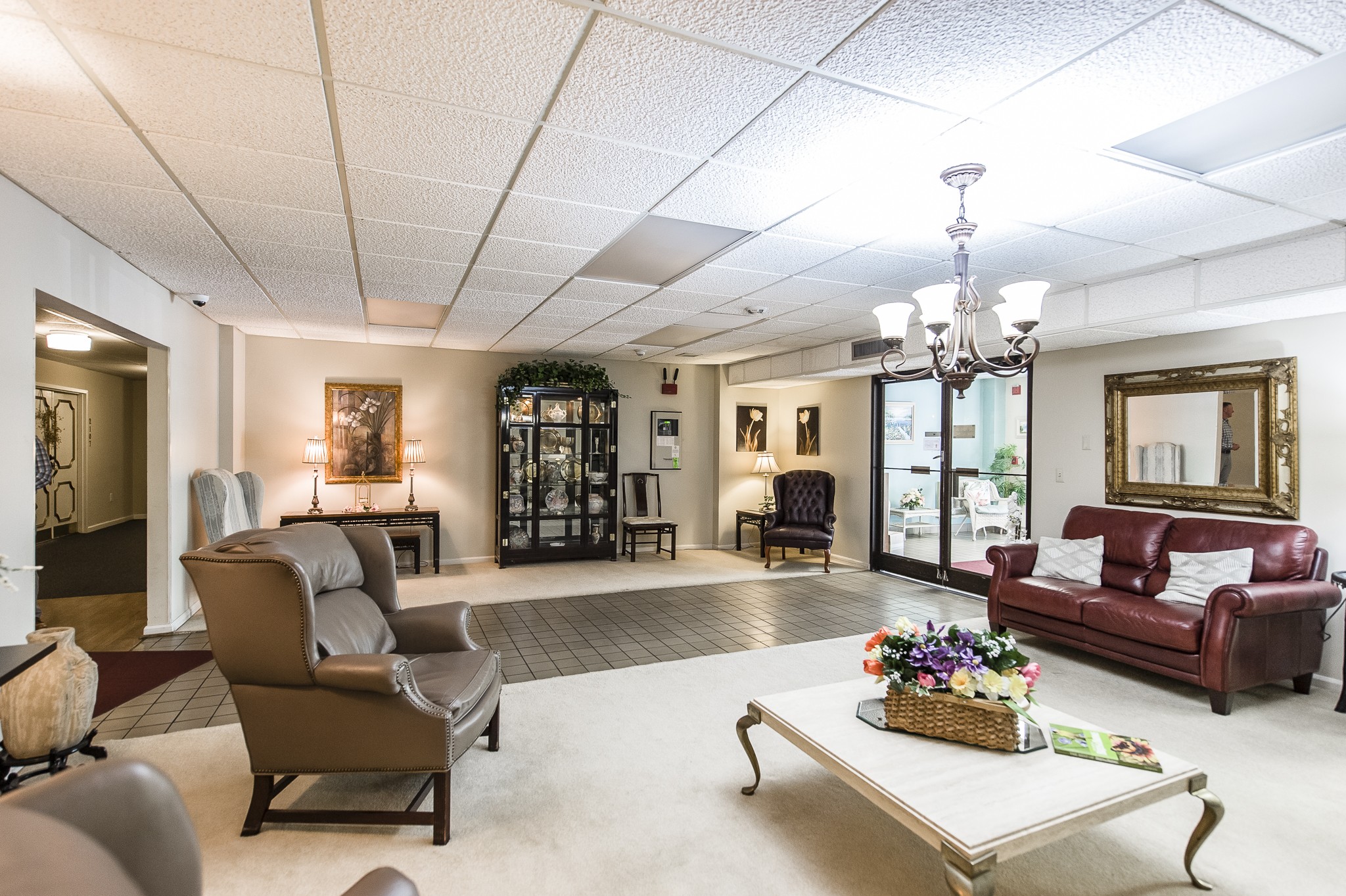 200 Sanders Ferry Road, Unit 2103 Hendersonville, TN 37075 - Photo 10 of 53 a living room with furniture couches and a chandelier