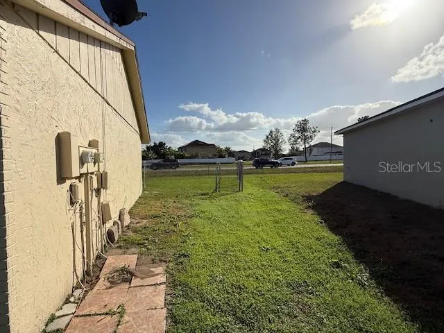 a view of a lake with a big yard