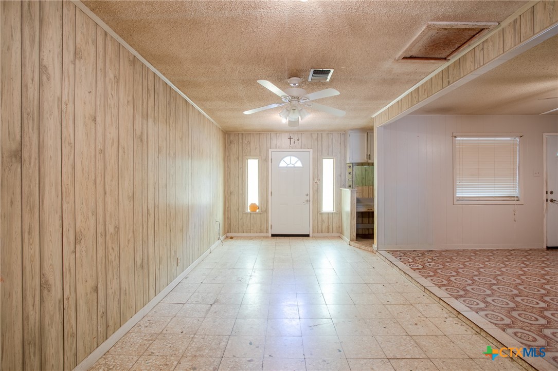 2903 Gayle Street Victoria, TX 77901 - Photo 9 of 21 a view of a hallway with wooden floor