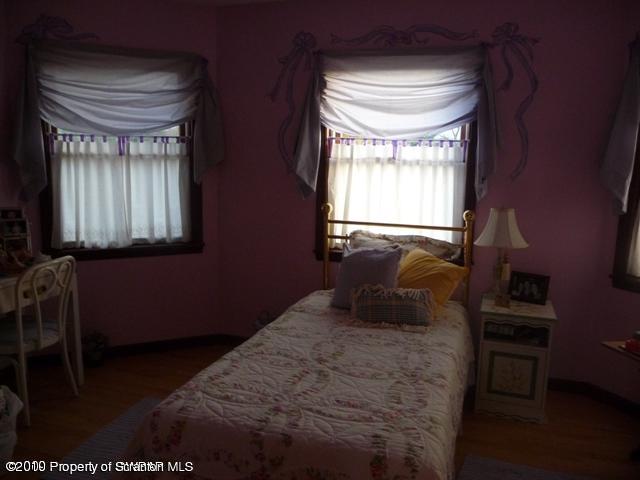 214 Willow Road Pittston, PA 18640 - Photo 15 of 19 a bedroom with a bed and a window
