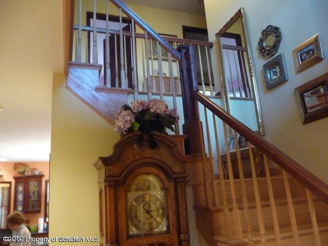 214 Willow Road Pittston, PA 18640 - Photo 3 of 19 a view of stairs and with wooden floor