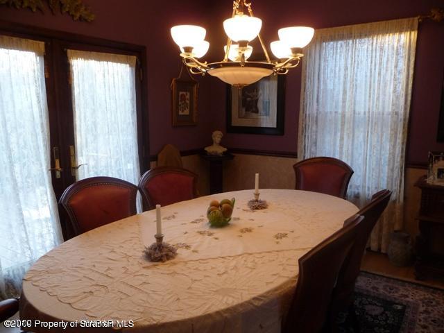 214 Willow Road Pittston, PA 18640 - Photo 6 of 19 a view of a dining room with furniture and a chandelier