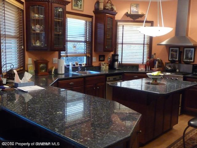 214 Willow Road Pittston, PA 18640 - Photo 7 of 19 a kitchen with a sink a counter top space and cabinets