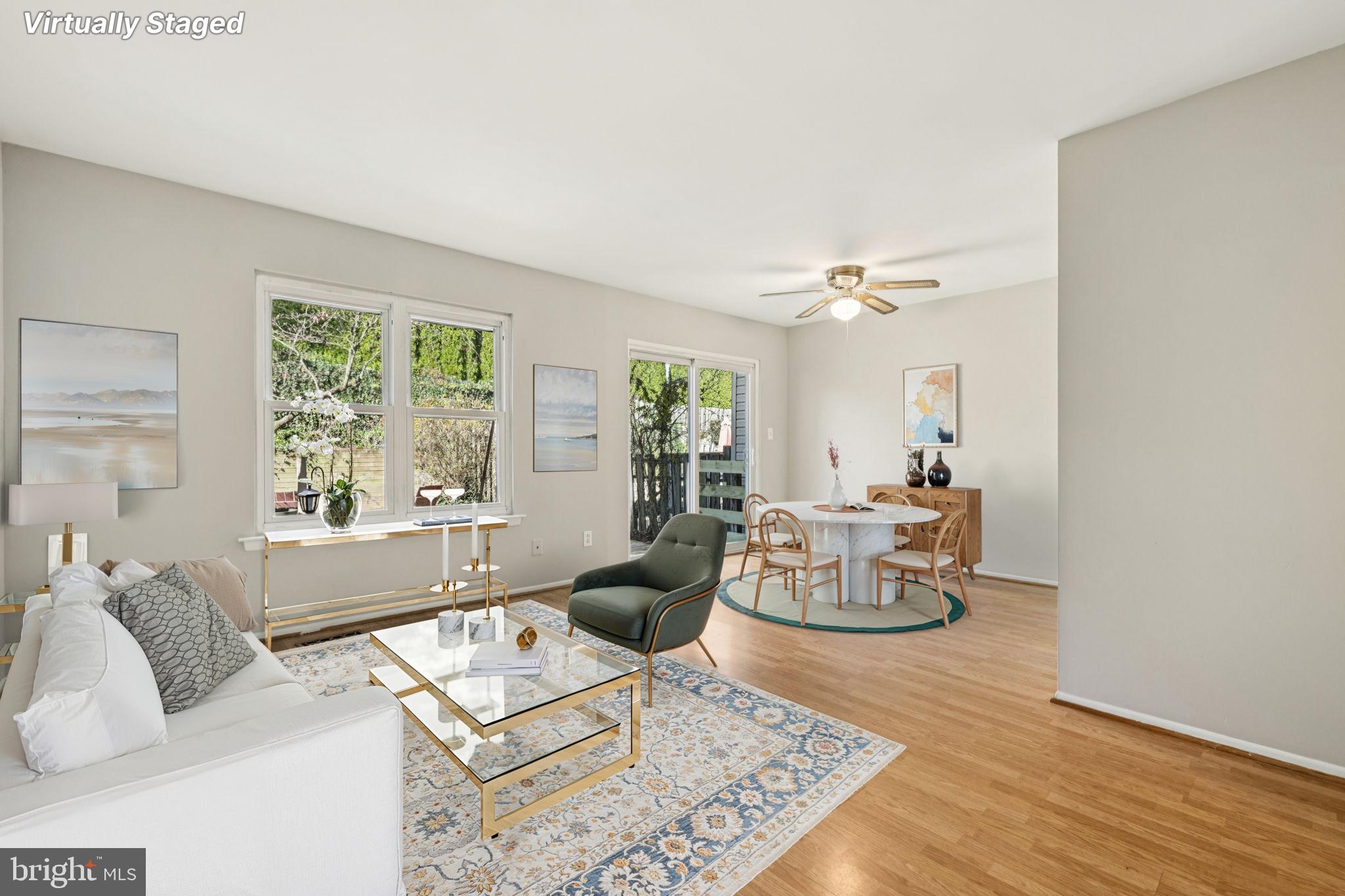 19924 Wyman Way Germantown, MD 20874 - Photo 13 of 47 a living room with furniture and a large window