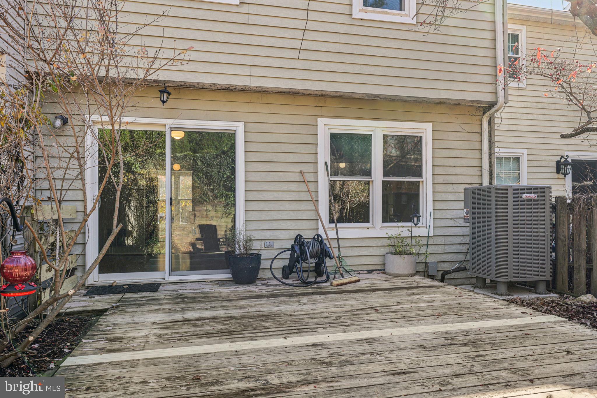 19924 Wyman Way Germantown, MD 20874 - Photo 29 of 47 a front view of a house with a yard