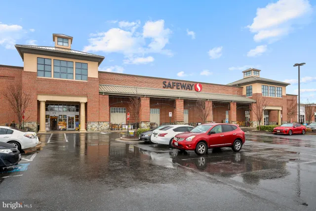 a view of a hall with wooden floor