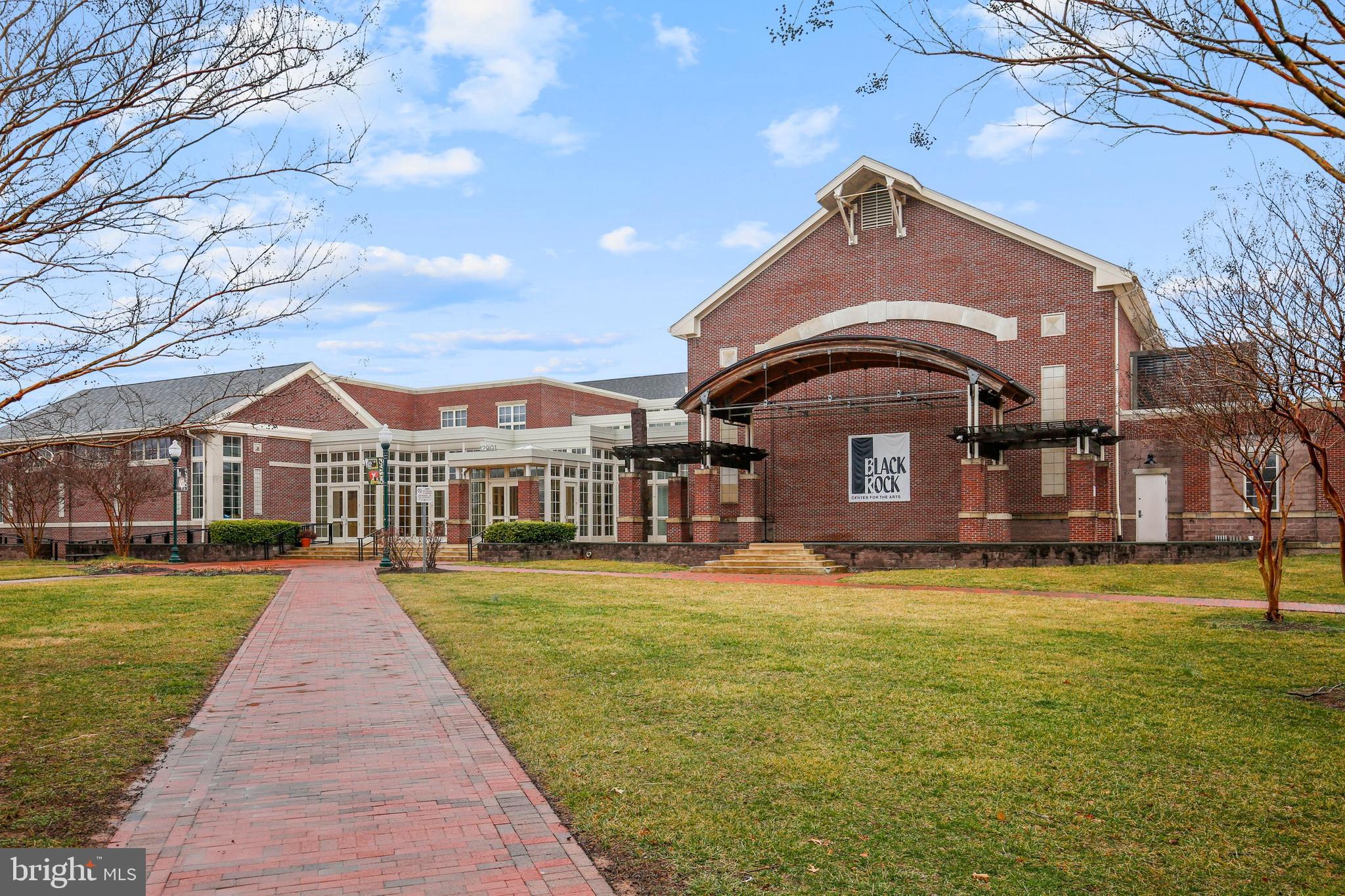 19924 Wyman Way Germantown, MD 20874 - Photo 42 of 47 a front view of a house with a yard