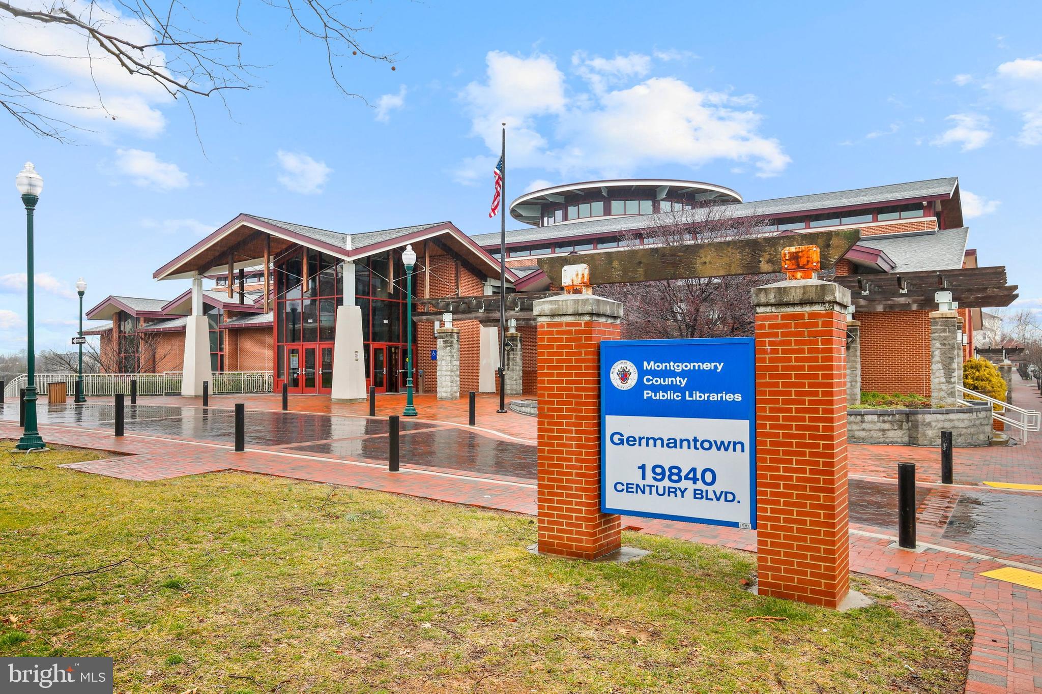 19924 Wyman Way Germantown, MD 20874 - Photo 44 of 47 a front view of a building with retail shops