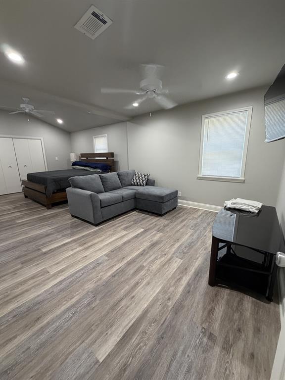 118 Carolyn Street Mansfield, LA 71052 - Photo 16 of 26 a living room with furniture and a wooden floor