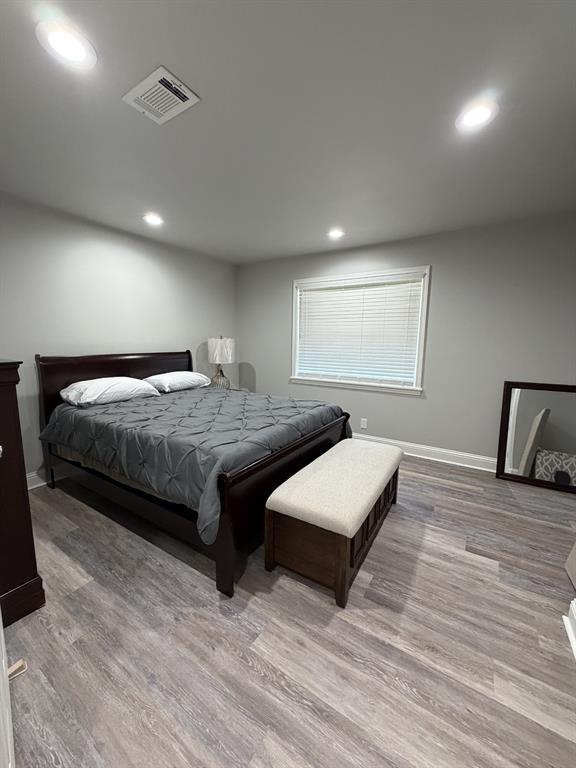 118 Carolyn Street Mansfield, LA 71052 - Photo 22 of 26 a bedroom with a bed and window