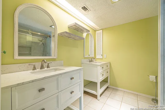 a bathroom with a shower and a toilet