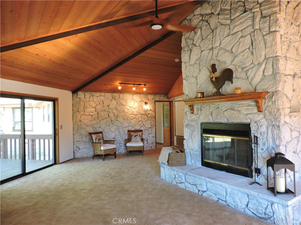 26931 Columbia Way Tehachapi, CA 93561 - Photo 26 of 49 Gorgeous wood vaulted ceiling! Fireplace and Rock Wall have been newly limewashed.