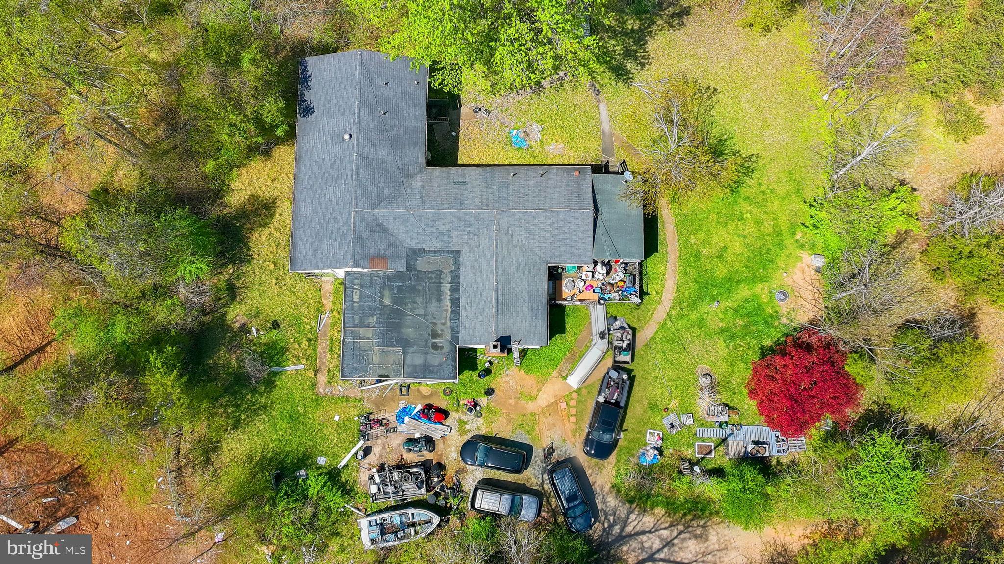 2263 Buckner Road Bumpass, VA 23024 - Photo 19 of 26 Sprawling property with lush greenery.