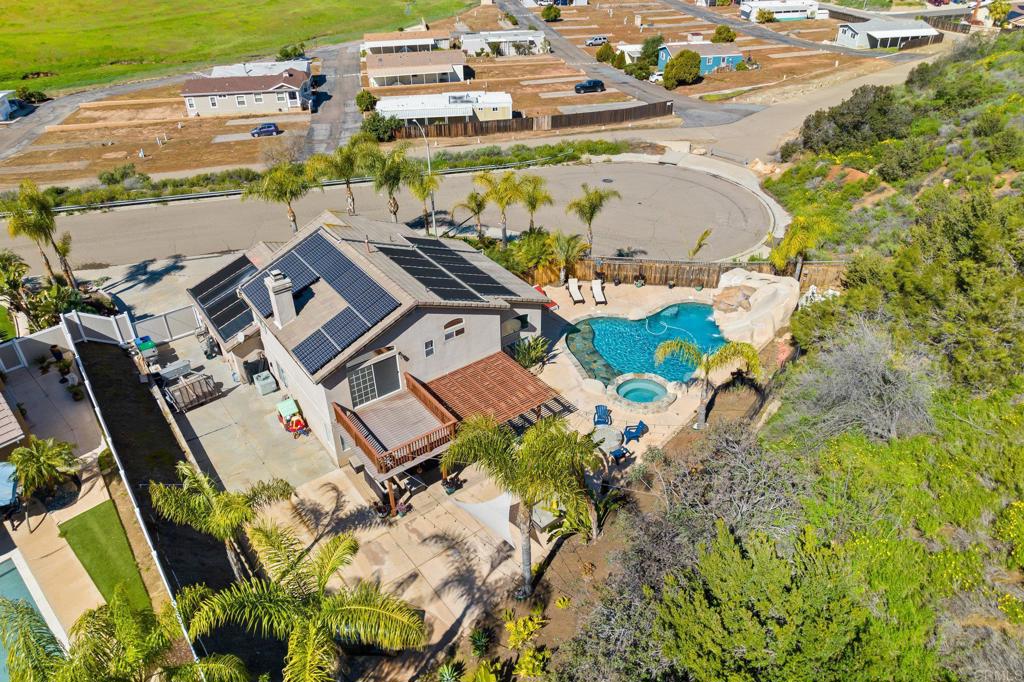 13675 Stonybrook Lane El Cajon, CA 92021 - Photo 29 of 34 an aerial view of residential houses with outdoor space