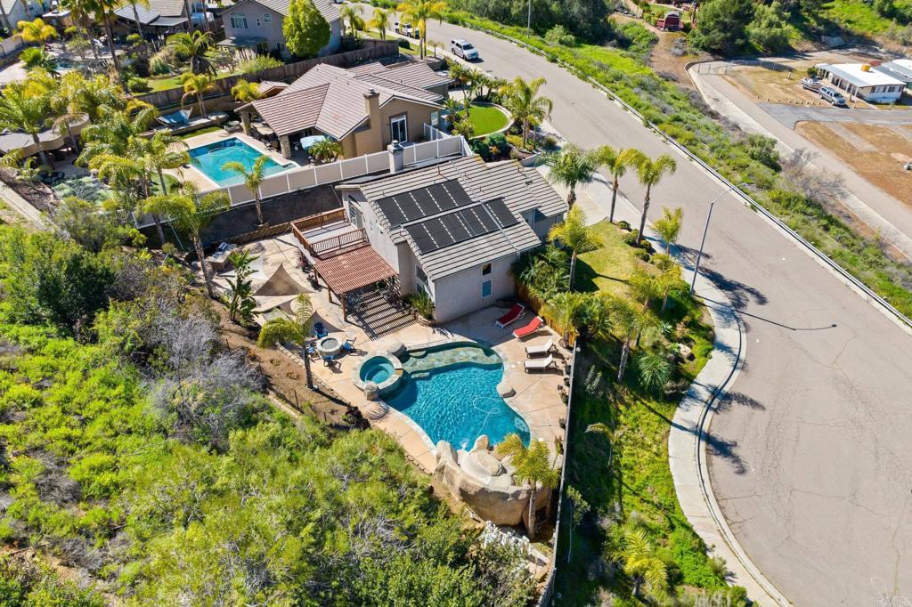 13675 Stonybrook Lane El Cajon, CA 92021 - Photo 30 of 34 an aerial view of a house with a yard and garden