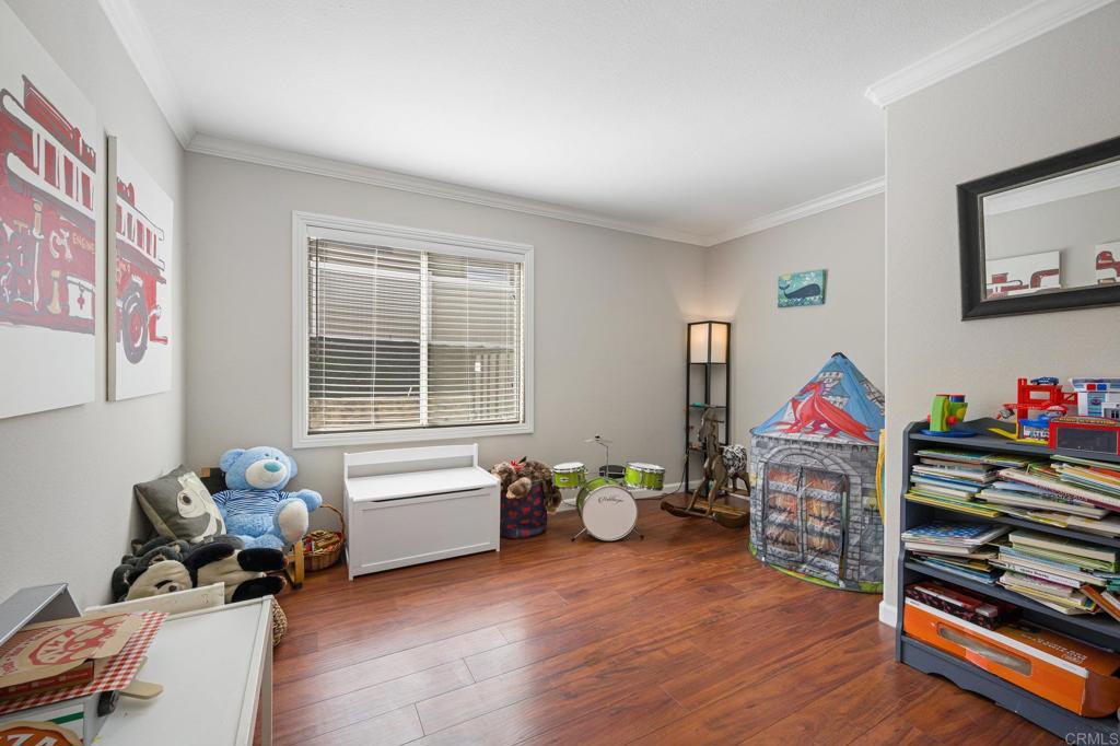 13675 Stonybrook Lane El Cajon, CA 92021 - Photo 9 of 34 a living room with furniture and a window