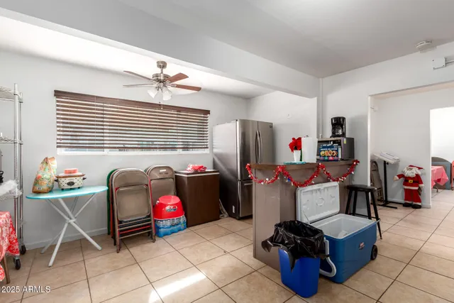 a front view of a house with garden and outdoor seating