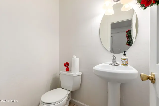 a patio with a table and chairs