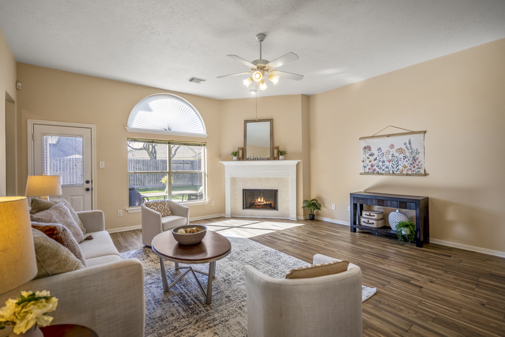 21107 Coldde Meadow Lane Spring, TX 77379 - Photo 19 of 50 a living room with furniture a window and a fireplace