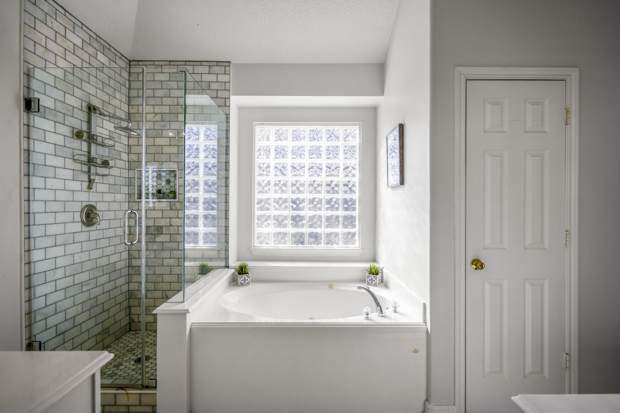 21107 Coldde Meadow Lane Spring, TX 77379 - Photo 24 of 50 a bath room with a sink and a bath tub