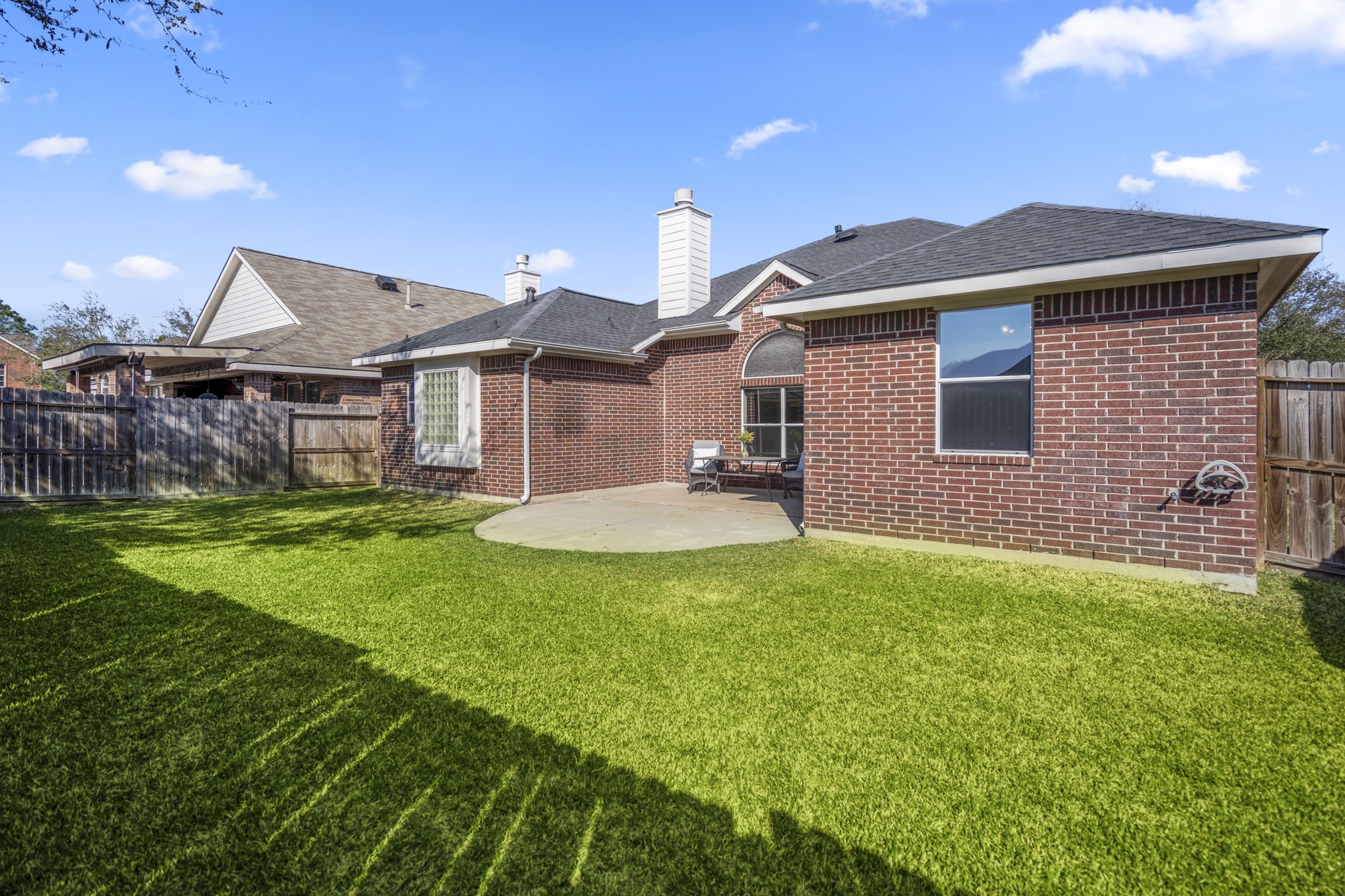 21107 Coldde Meadow Lane Spring, TX 77379 - Photo 36 of 50 a front view of a house with a yard and garage