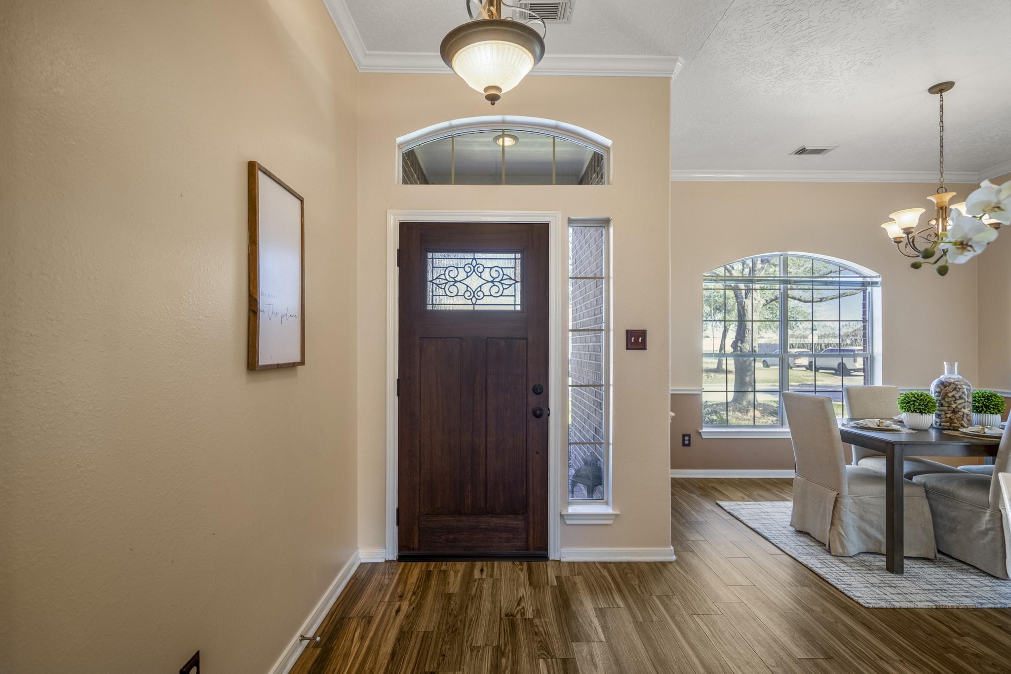 21107 Coldde Meadow Lane Spring, TX 77379 - Photo 4 of 50 Just off the entry, the formal dining room offers a welcoming space for gathering around the table. Large front-facing windows bring in natural light, while the open connection to the foyer keeps the space feeling bright and easy to move through as guests arrive.