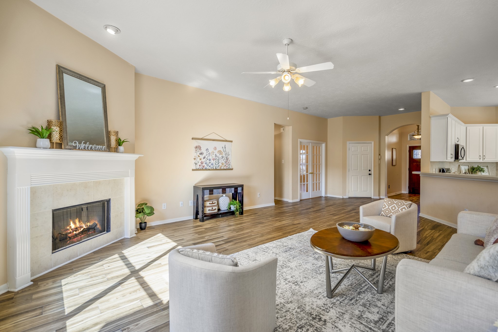 21107 Coldde Meadow Lane Spring, TX 77379 - Photo 9 of 50 a living room with furniture a table and a fireplace
