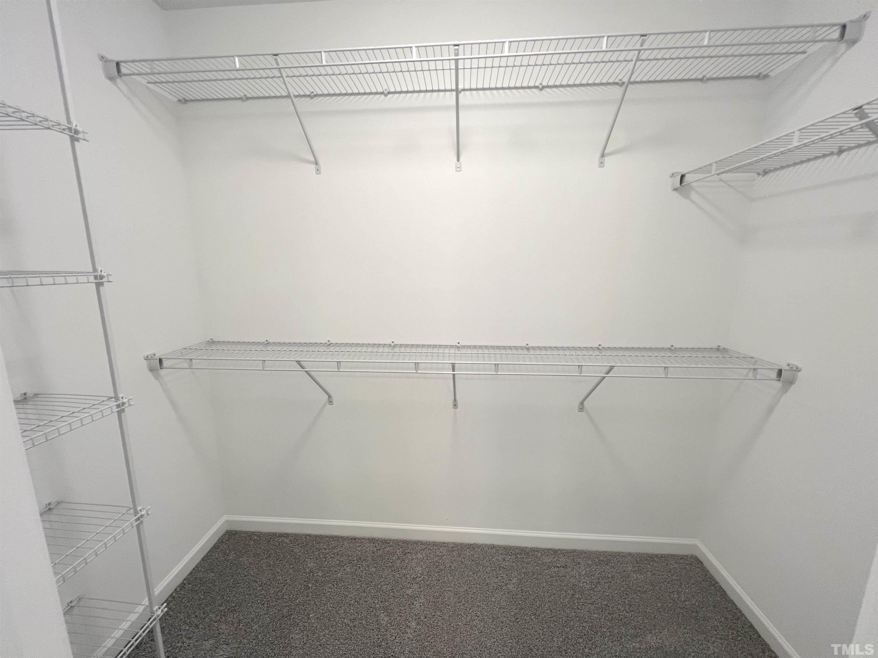 111 Adds Road Pikeville, NC 27863 - Photo 15 of 23 a view of a room with racks on the wall