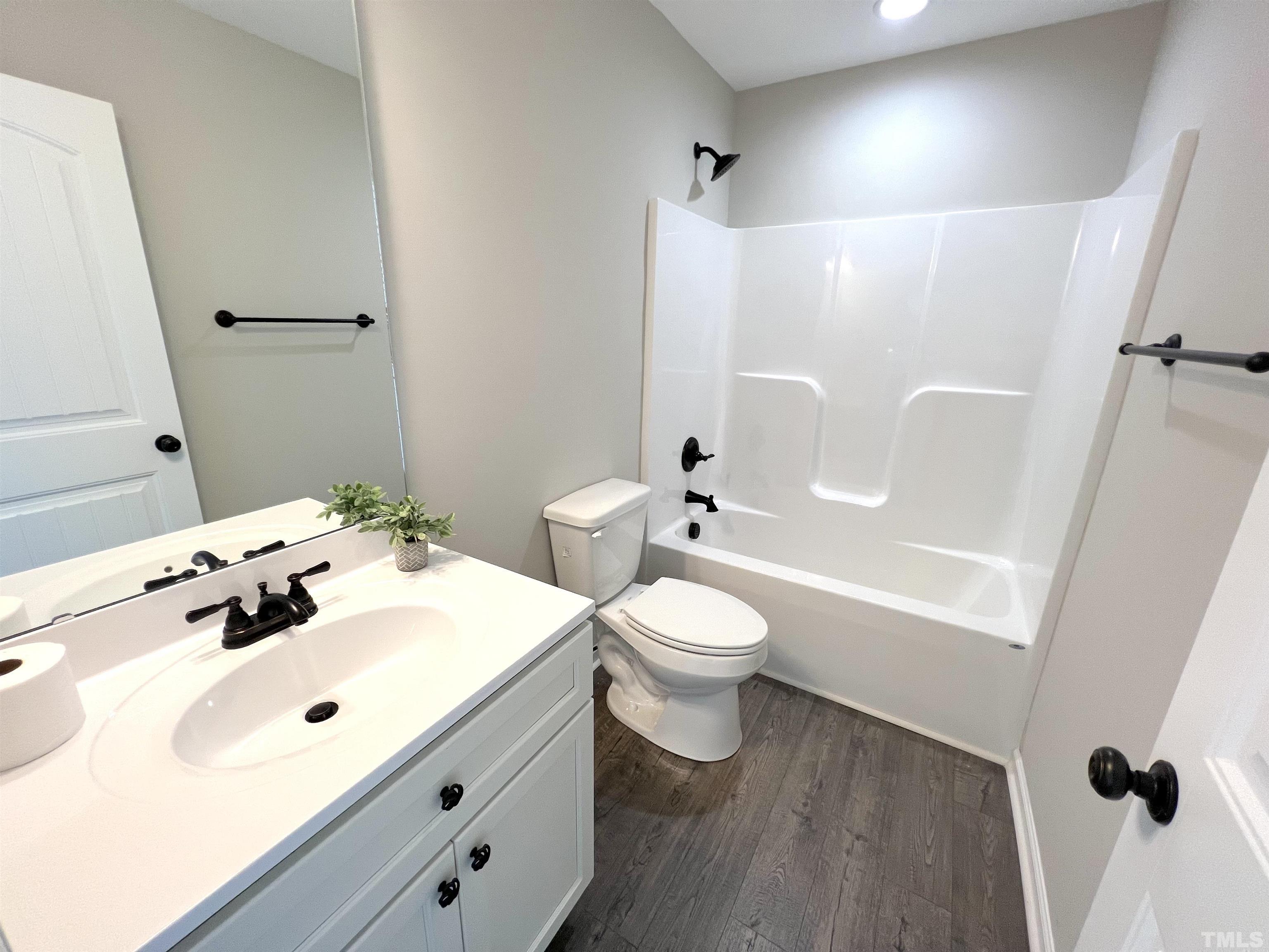 111 Adds Road Pikeville, NC 27863 - Photo 20 of 23 a bathroom with a sink a toilet and shower
