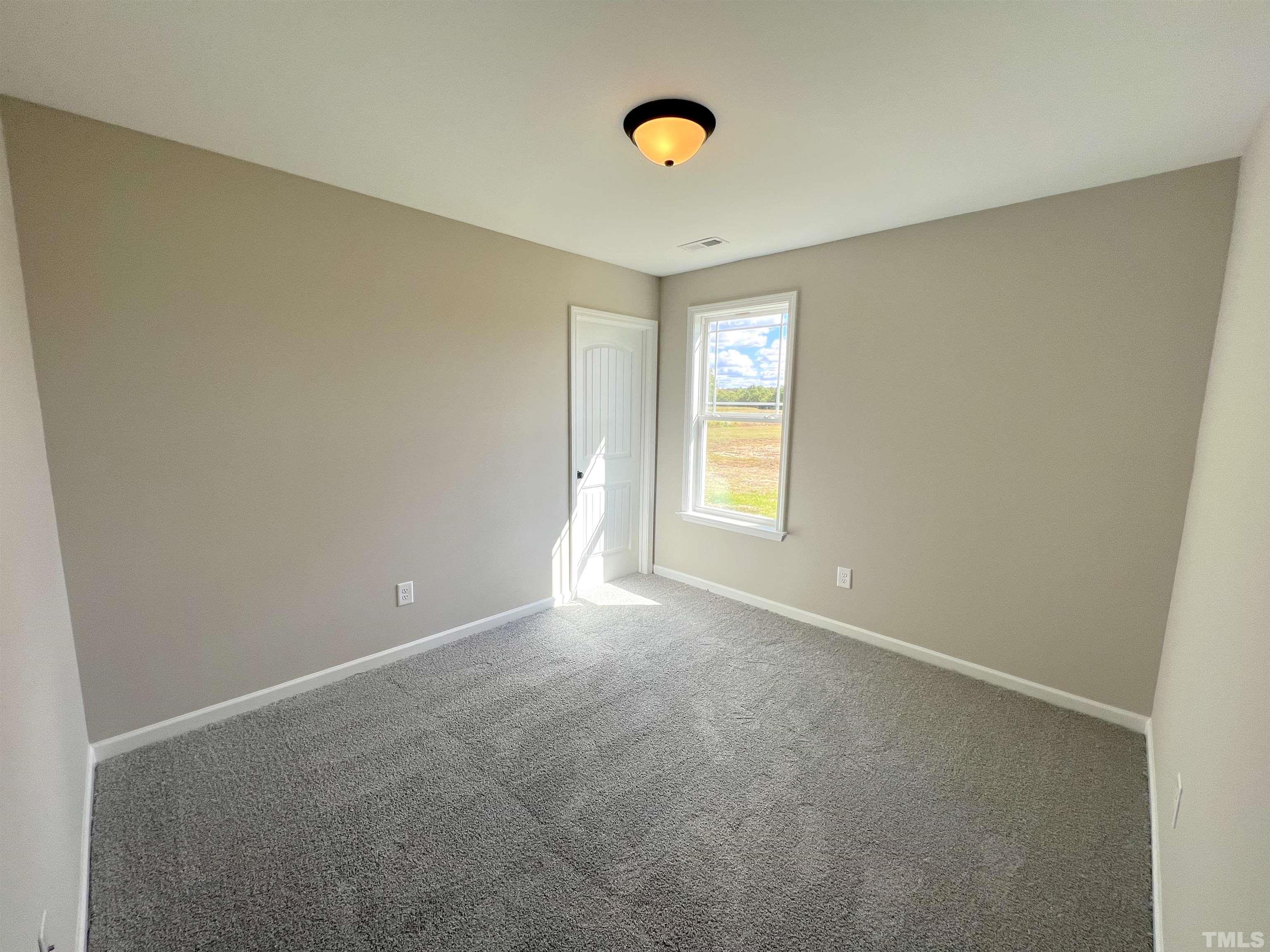 111 Adds Road Pikeville, NC 27863 - Photo 21 of 23 a view of an empty room and window
