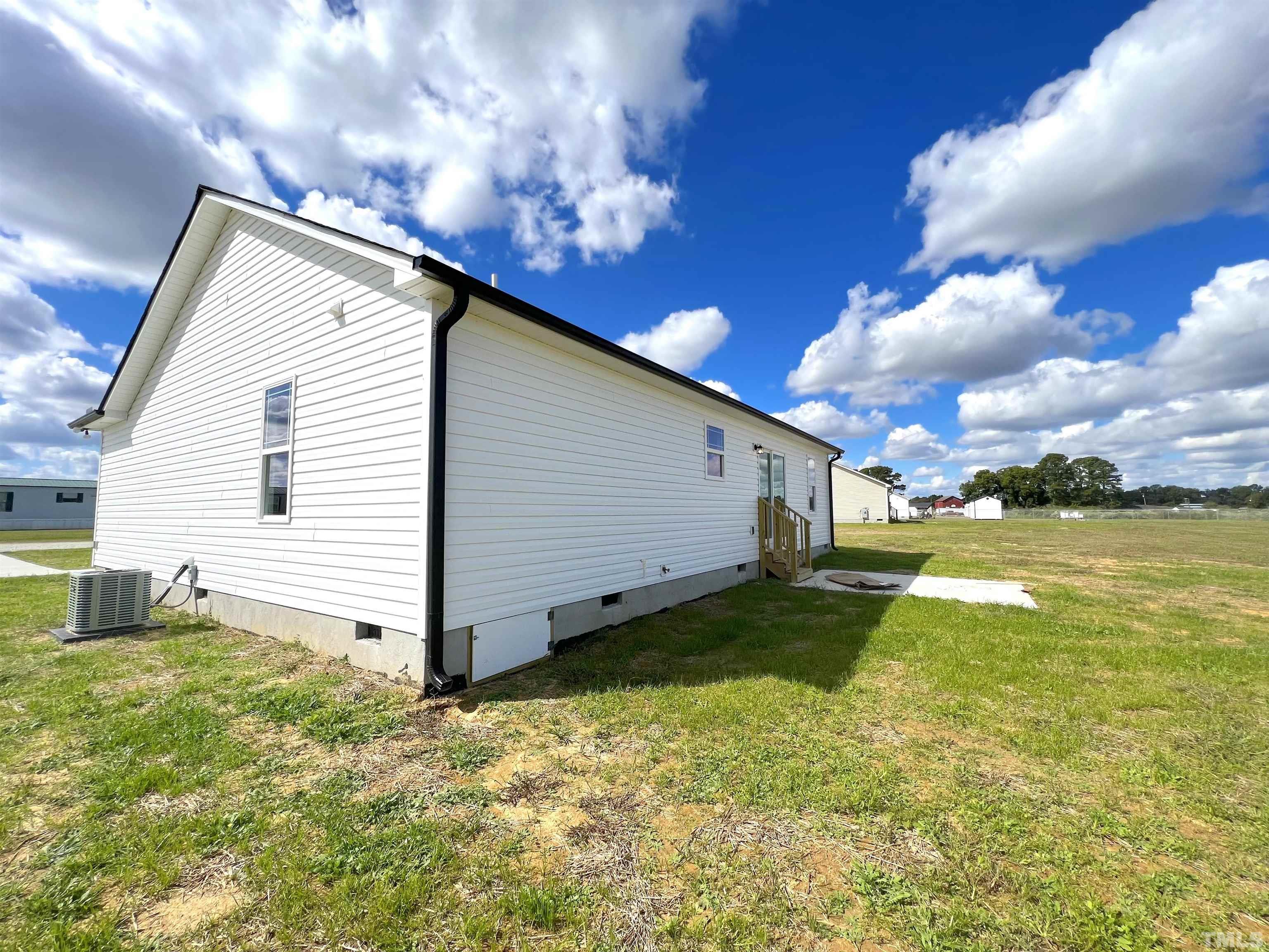 111 Adds Road Pikeville, NC 27863 - Photo 22 of 23 a view of a backyard of the house