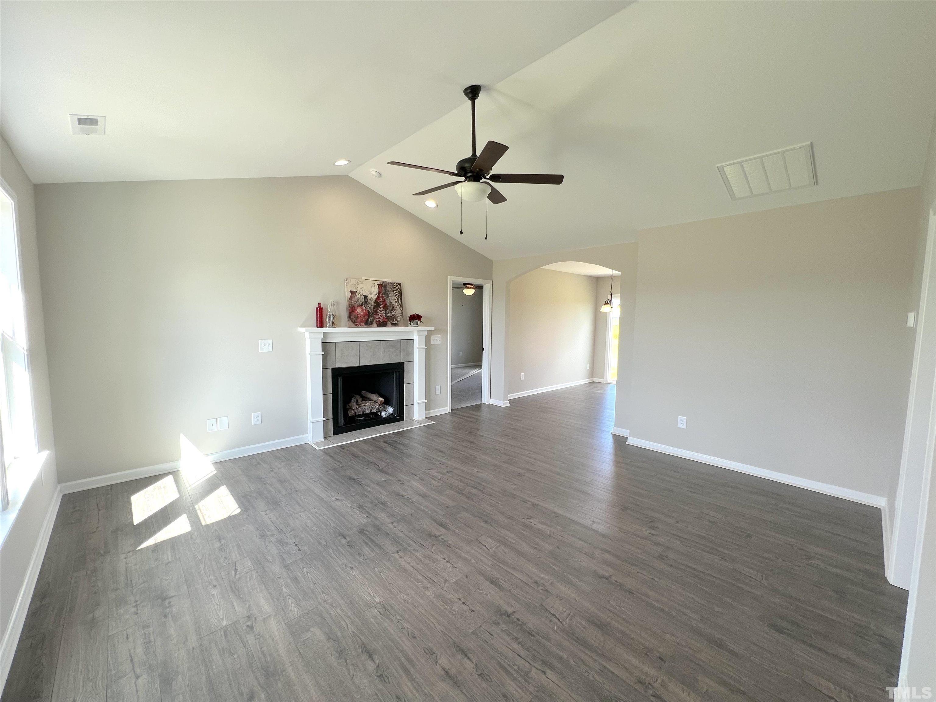 111 Adds Road Pikeville, NC 27863 - Photo 3 of 23 a view of an empty room with window and fireplace
