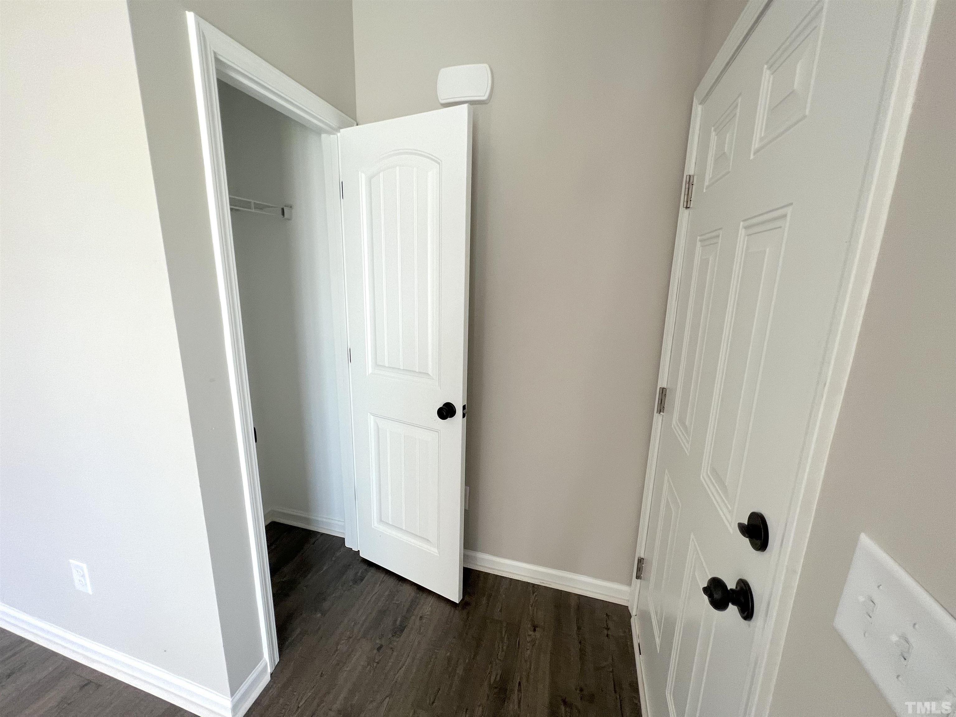111 Adds Road Pikeville, NC 27863 - Photo 4 of 23 a view of a hallway with wooden floor