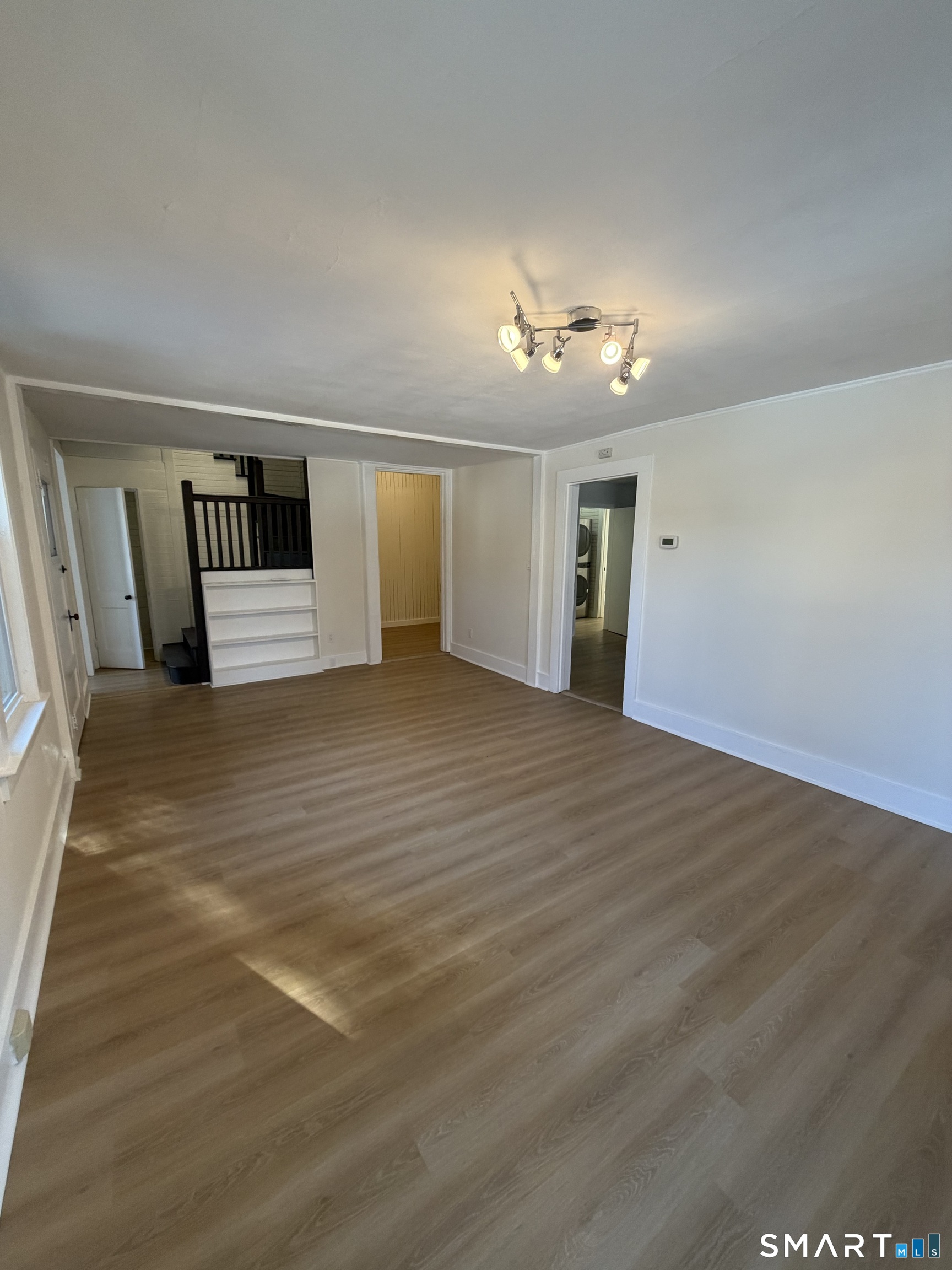 473 Amity Road Woodbridge, CT 06525 - Photo 11 of 16 a view of a livingroom with a fireplace
