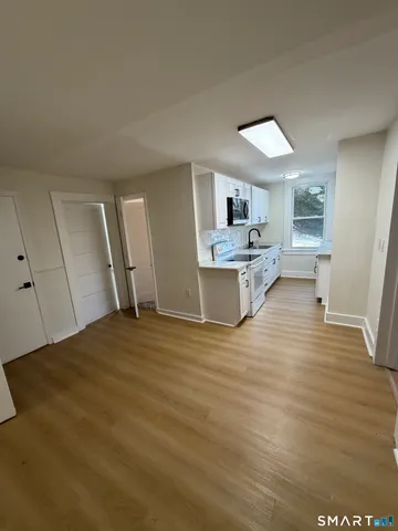 a view of a kitchen and a sink