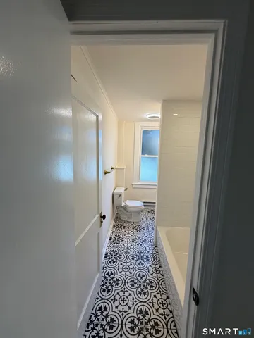 a bathroom with a sink and a shower