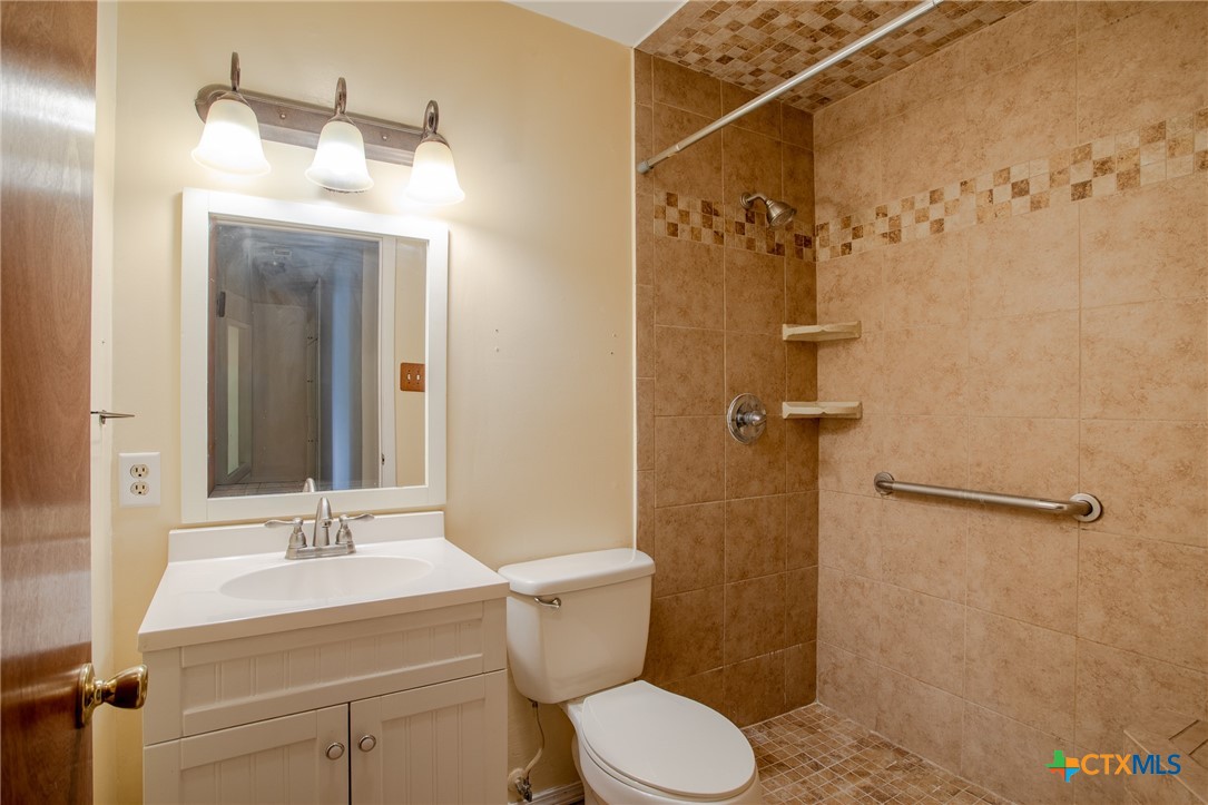 2903 Gayle Street Victoria, TX 77901 - Photo 15 of 21 a bathroom with a sink a toilet and shower