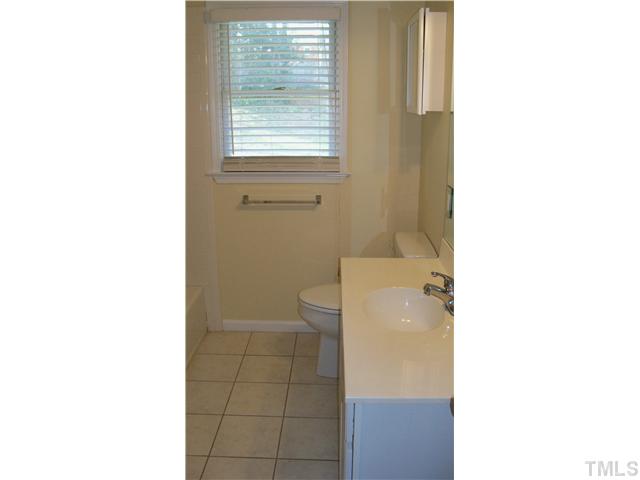 2124 Balboa Road Raleigh, NC 27603 - Photo 13 of 24 Second floor bath with tub and separate shower. Ceramic tile tub surround and floors