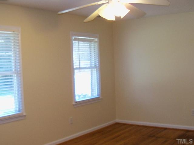 2124 Balboa Road Raleigh, NC 27603 - Photo 2 of 24 Living room with hardwood floors, ceiling fan and recessed lighting