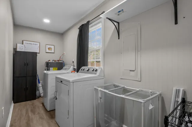 a utility room with washer and dryer