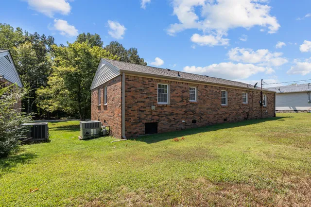 a view of a backyard with a garden