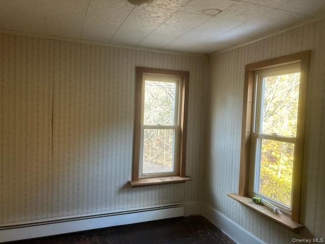 7 Highland Lake Road Eldred, NY 12732 - Photo 12 of 14 an empty room with wooden floor and windows