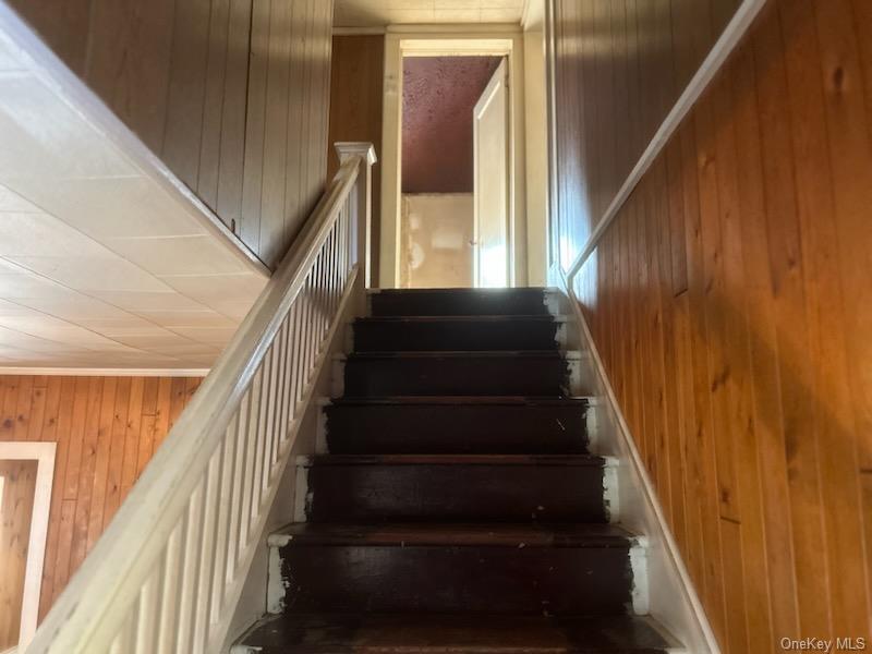 7 Highland Lake Road Eldred, NY 12732 - Photo 7 of 14 a view of staircase with wooden floor and white walls