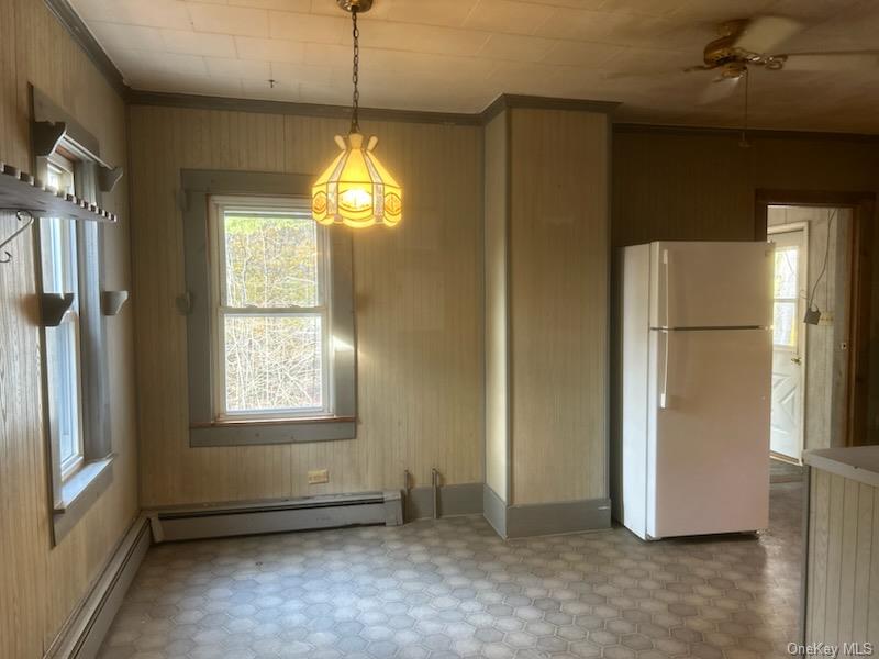 7 Highland Lake Road Eldred, NY 12732 - Photo 10 of 14 a view of an empty room with a window and kitchen view
