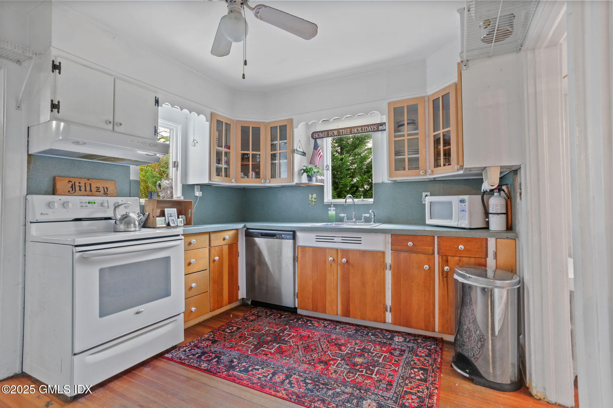 7 Highview Avenue Old Greenwich, CT 06870 - Photo 11 of 28 a kitchen with stainless steel appliances granite countertop a stove a sink and a refrigerator