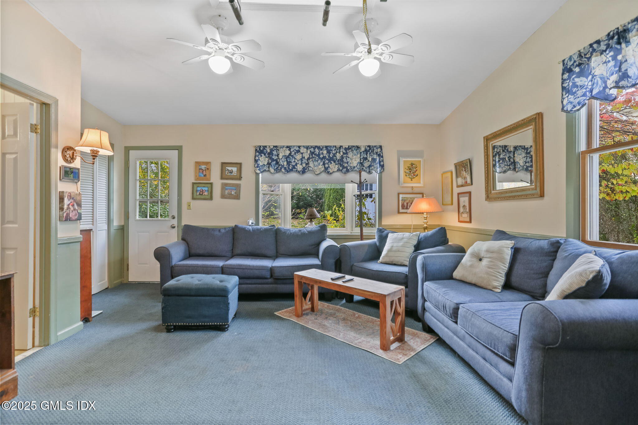 7 Highview Avenue Old Greenwich, CT 06870 - Photo 14 of 28 a living room with furniture and a large window