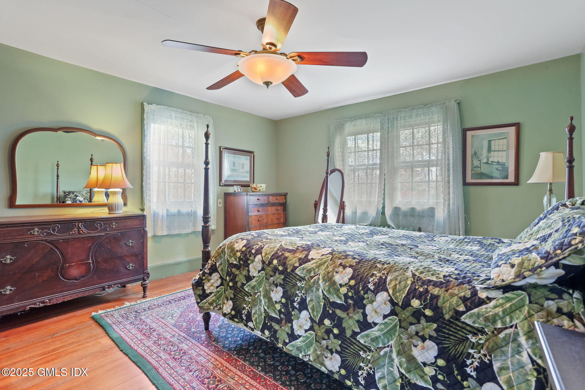 7 Highview Avenue Old Greenwich, CT 06870 - Photo 16 of 28 a bedroom with a bed and a dresser