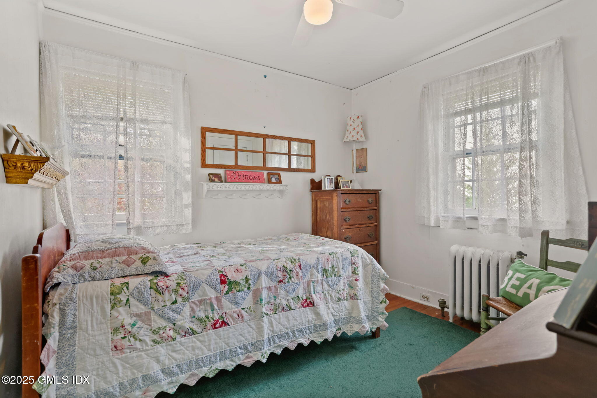 7 Highview Avenue Old Greenwich, CT 06870 - Photo 18 of 28 a bedroom with a bed and a window