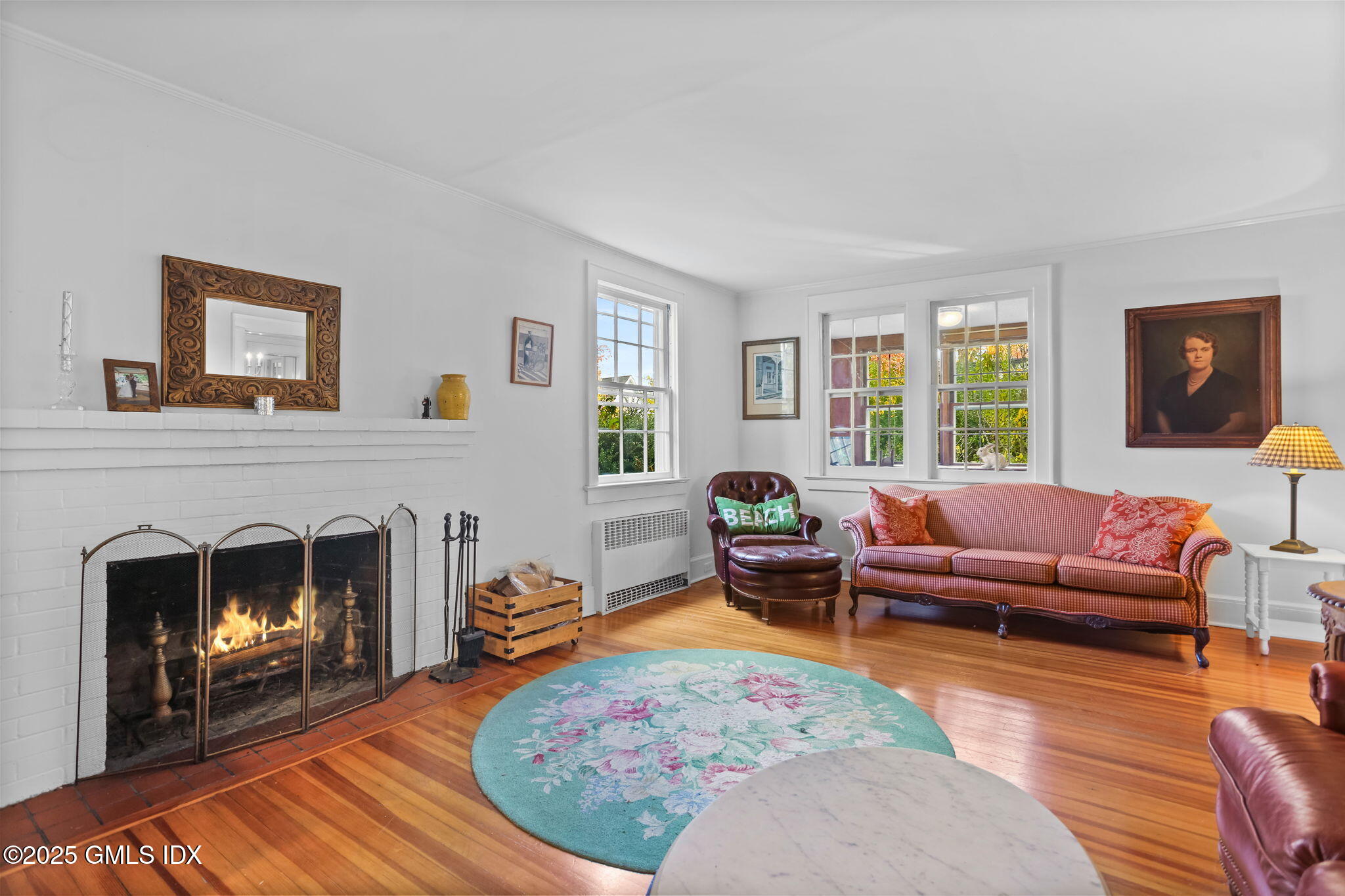 7 Highview Avenue Old Greenwich, CT 06870 - Photo 6 of 28 a living room with furniture and a fireplace