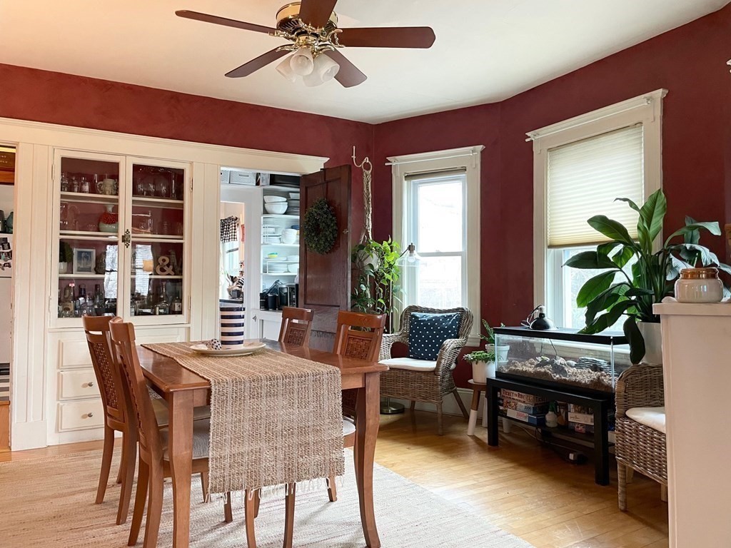 51 Presentation Road, Unit 1 Boston, MA 02135 - Photo 3 of 15 a dining room with furniture and window